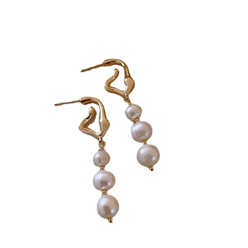oucles d'oreilles perles baroques or 14k femme
