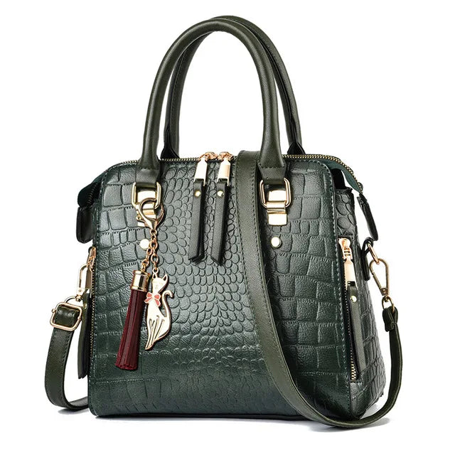 Sac à main motif crocodile pompon luxe femme