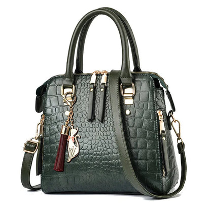 Sac à main motif crocodile pompon luxe femme