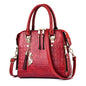 Sac à main motif crocodile pompon luxe femme