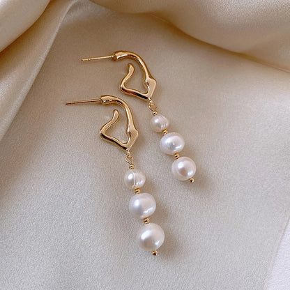 oucles d'oreilles perles baroques or 14k femme