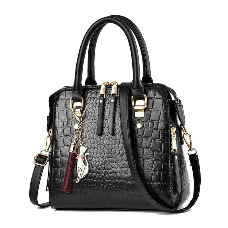 Sac à main motif crocodile pompon luxe femme