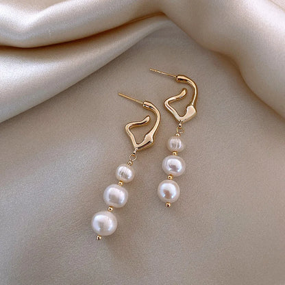 oucles d'oreilles perles baroques or 14k femme