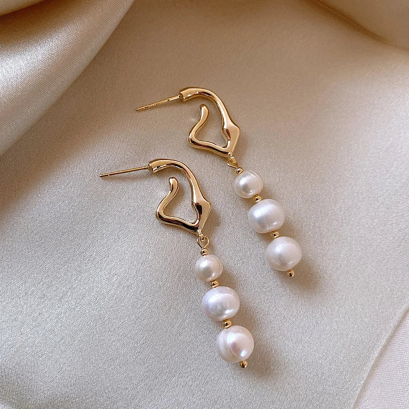 oucles d'oreilles perles baroques or 14k femme