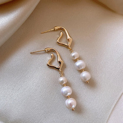 oucles d'oreilles perles baroques or 14k femme